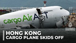 Two killed as cargo plane skids off Hong Kong runway