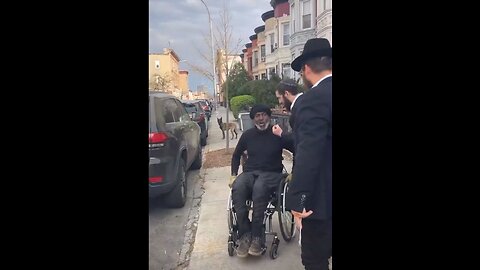 Fake Jew Pushes Black Man Out Of His Wheelchair