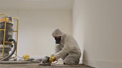 Asbestos work days floor grinding