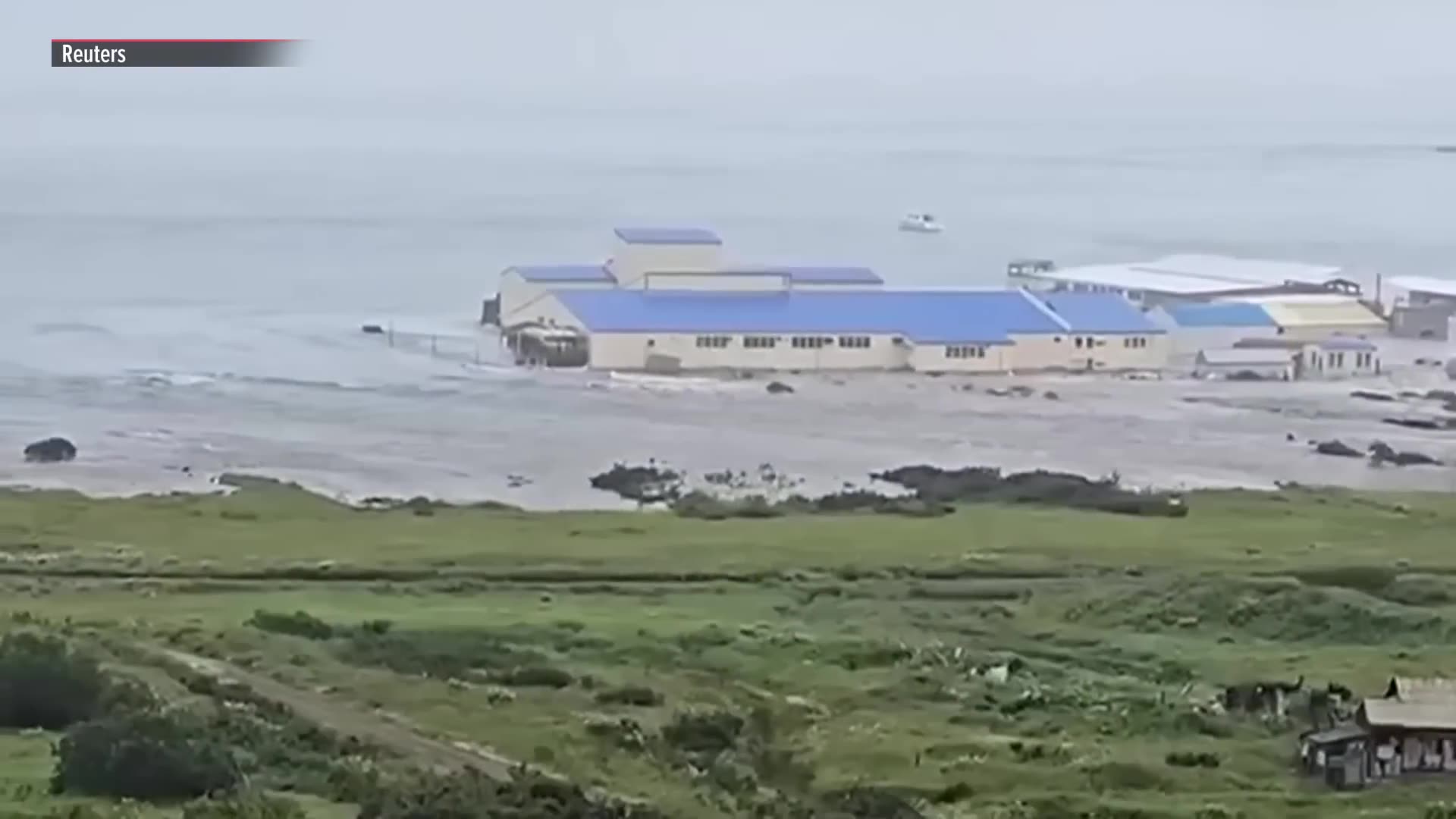 MOMENT: Tsunami crashes over coastline in Russias Far East region