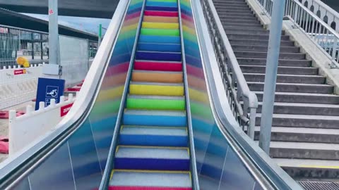 First escalator with rainbow-colored lighting symbolizing LGBT movement