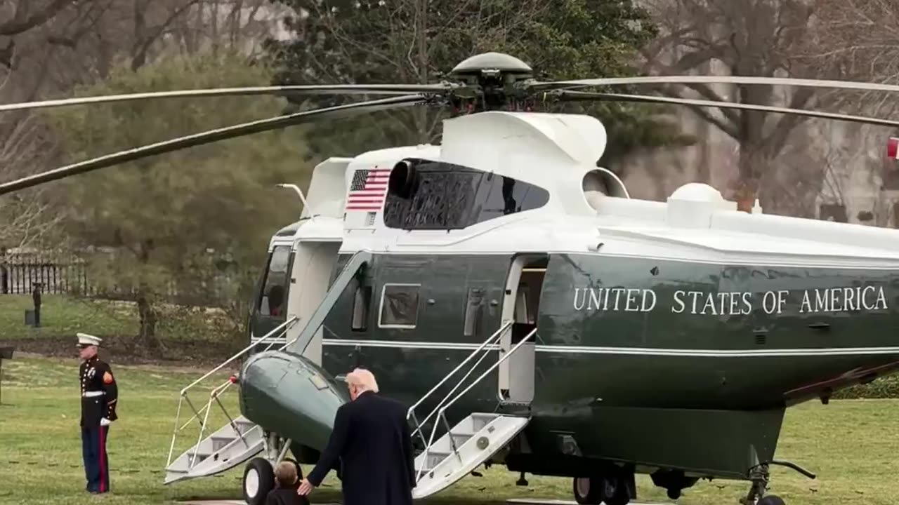 JUST IN - President Trump walks to Marine One with Little X Elon Musk