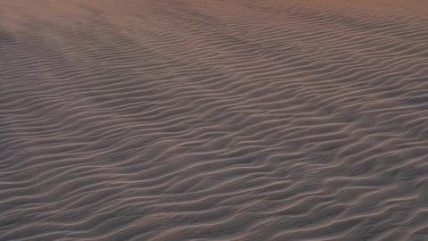 Captivating Desert Sunset Over Sand Dunes