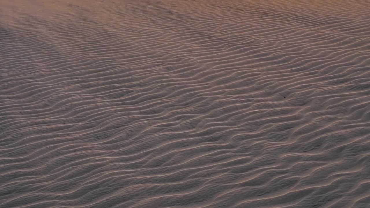Captivating Desert Sunset Over Sand Dunes