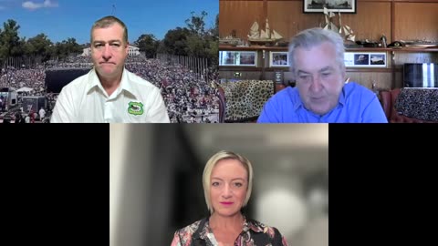 Graham speaks with ACA representatives John Larter and Katie Ashby-Koppens.