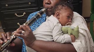 New Orleans jazz clarinetist Doreen Ketchens plays for her grandson "You Are My Sunshine."