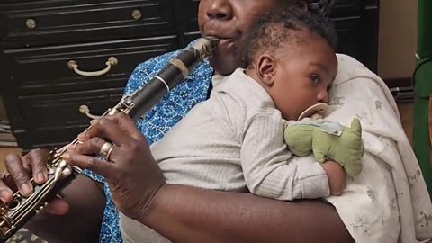 New Orleans jazz clarinetist Doreen Ketchens plays for her grandson "You Are My Sunshine."