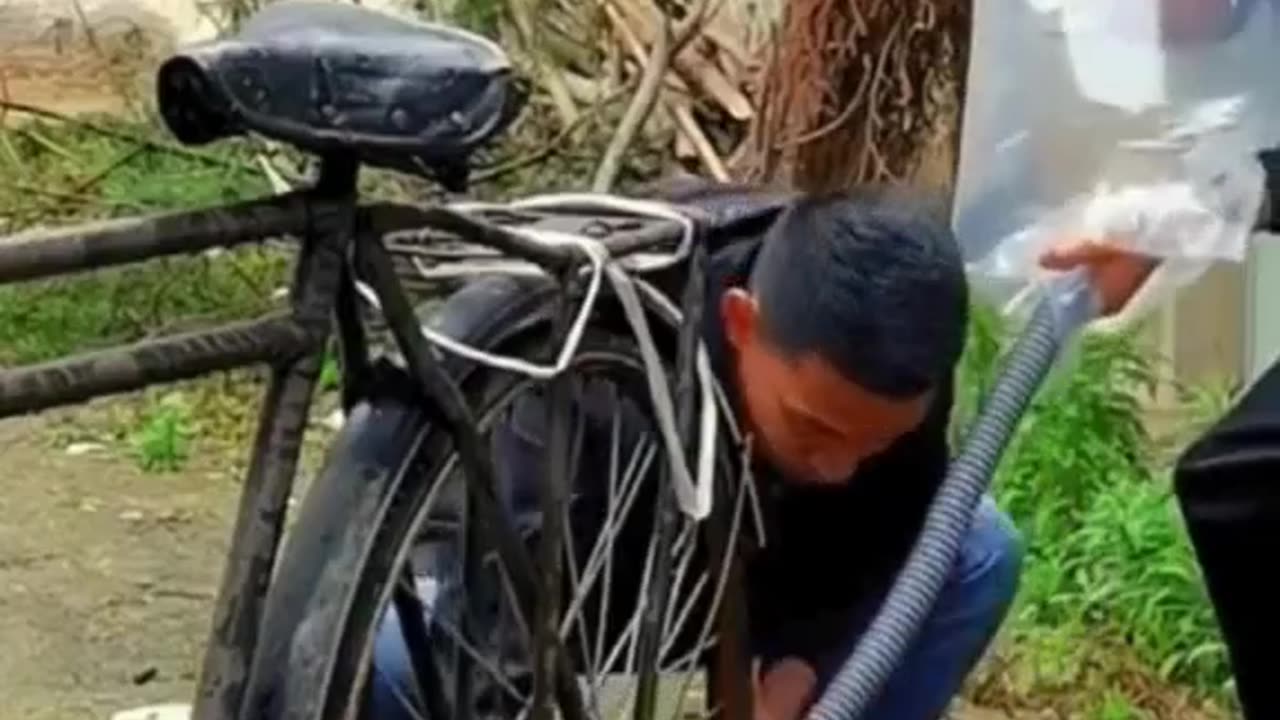 Funny but totally ineffective method to pump a bike tire! 😂🚴 #DIYFails
