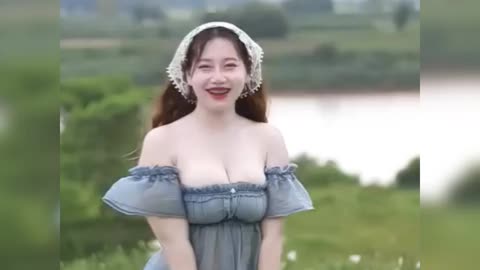 Hot tiktok - beautiful and cute girl dancing in the meadow