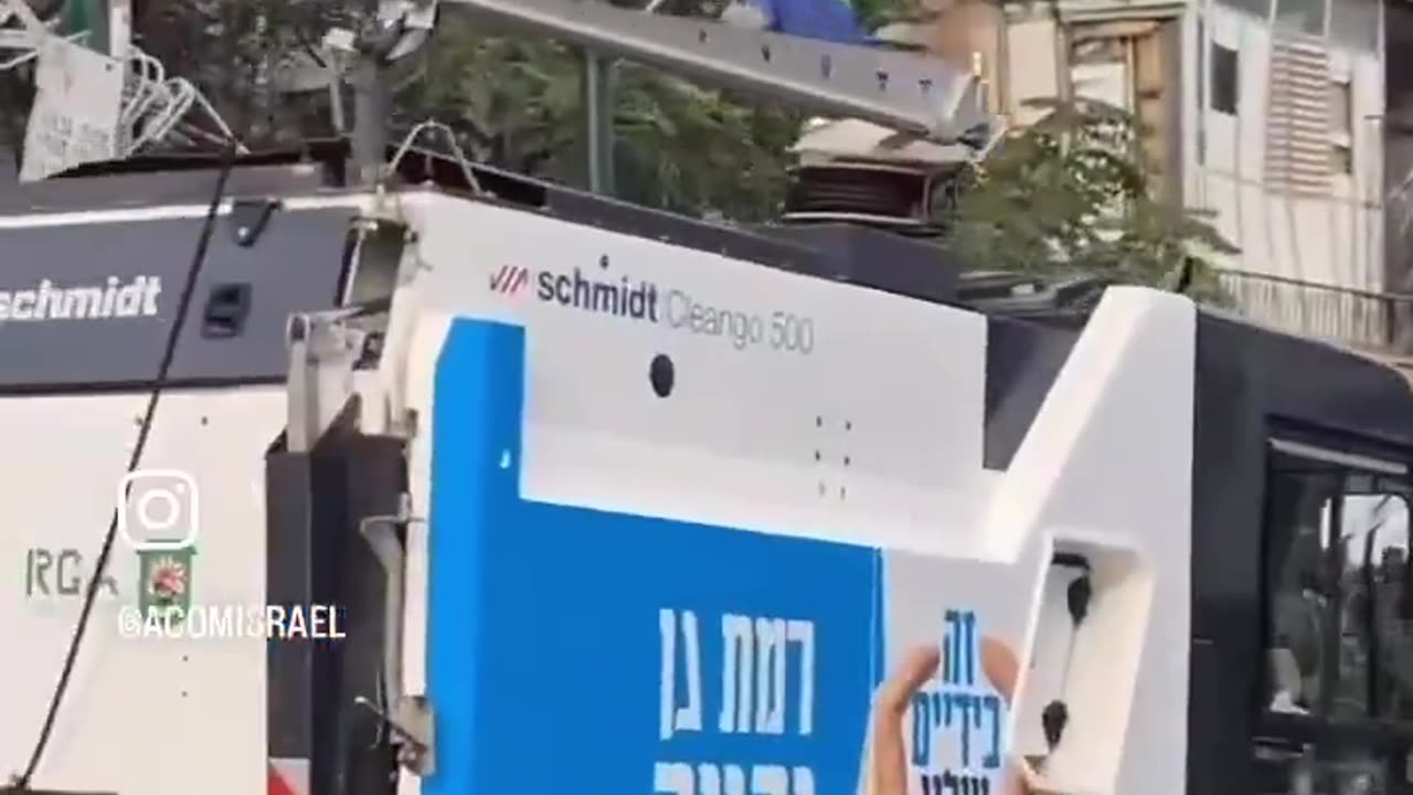 In the neighborhoods most devastated by Iran's bombings, Israelis gathered to raise flags.