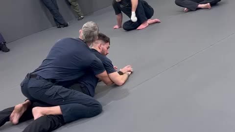 Single Officer Ground Control Flare Elbow to Block His Grab