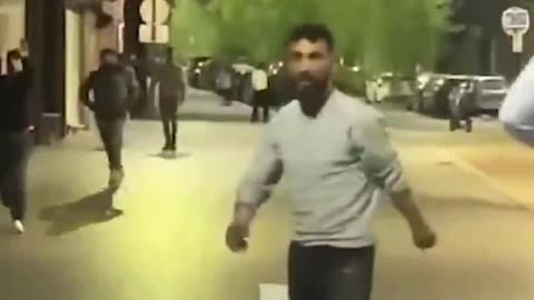 In Belgium, an antisocial refugee named Mohammed threatens a man with a machete because