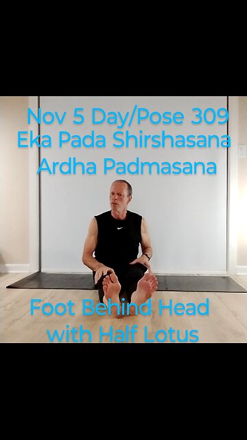 Eka Pada Shirshasana Ardha Padmasana / Foot Behind Head with Half Lotus