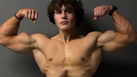 18 years old teen bodybuilder flexing muscles