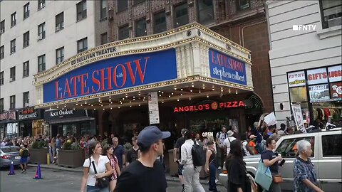 "Colbert Stays!" Sign at Protests Against Trump and Cancelation of Stephen Colbert Late Show in NYC