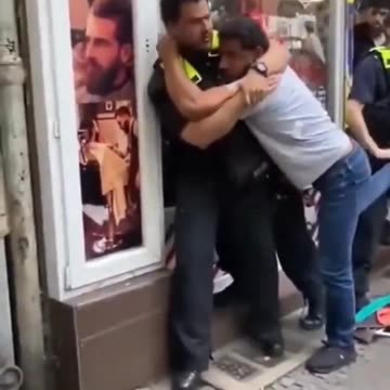 German police explain to usual suspect that women are not to be touched without permission.