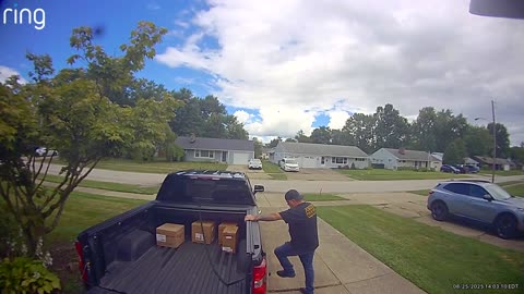 Man Loses Balance When Stepping Down From Pickup