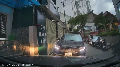 Typhoon Wipha Whips Roof Panel Into Scooter