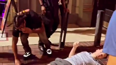 Blacks try to kick White man to death.