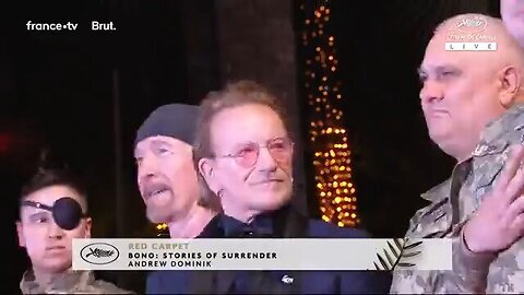 Ukrainian soldiers follow Bono and Sean Penn like lap dogs