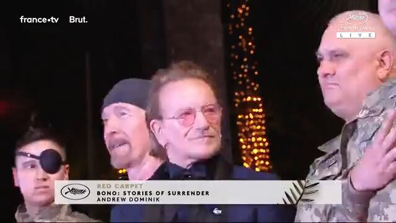 Ukrainian soldiers follow Bono and Sean Penn like lap dogs