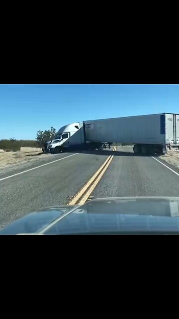 2 truck drivers who didn't speak English stuck because they didn't know truck had power divider