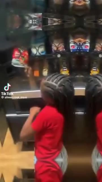 Black kids collecting FREE Snacks