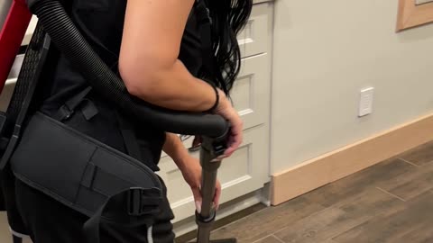 Cleaning the Kitchen With a Backpack Vacuum