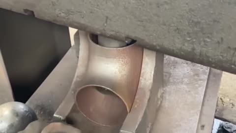 Metal Pressing to Shape a Curved Pipe