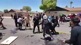 WATCH: Lunatics scuffle with police officers in Peoria, Ariz. as Homeland Security & ICE