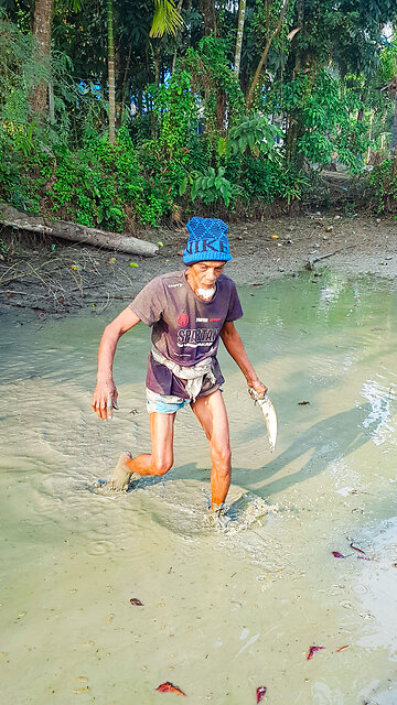 Hand fishing by uncle