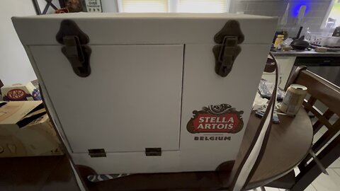 Stella Artois cooler with glass and cutlery