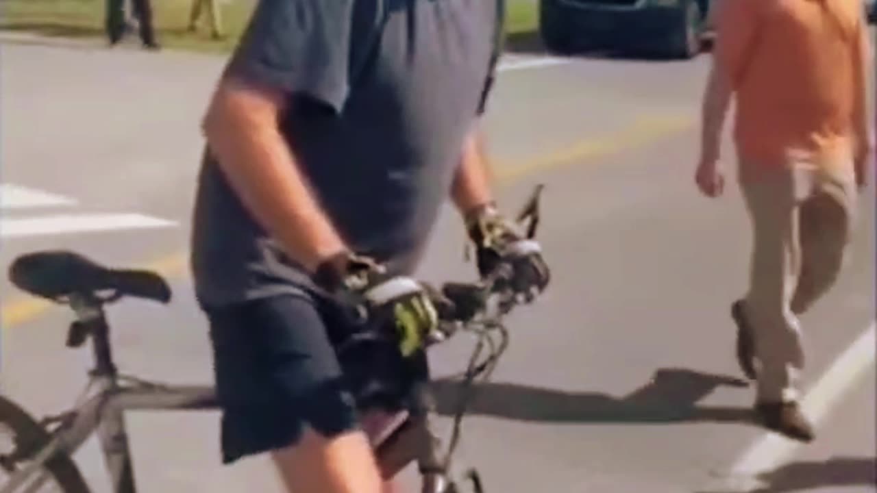 BIDEN FALLS OVER ON BIKE RIDE