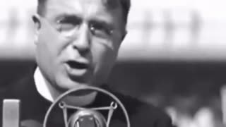 Father Charles Coughlin giving a speech in the 1930's mostly in opposition of the federal reserve