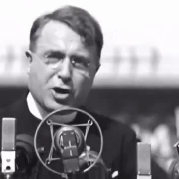 Father Charles Coughlin giving a speech in the 1930's mostly in opposition of the federal reserve