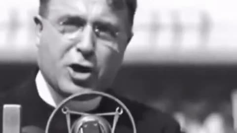 Father Charles Coughlin giving a speech in the 1930's mostly in opposition of the federal reserve