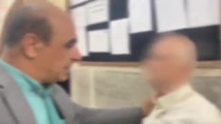 Iran TV from inside Evin Prison. (It appears to be holding cells in court)