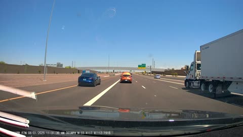 Car Drives on Freeway With Its Hood Up