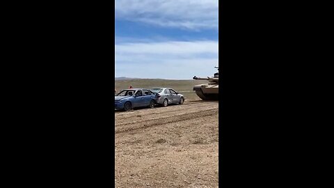 Military Tank runs over cars