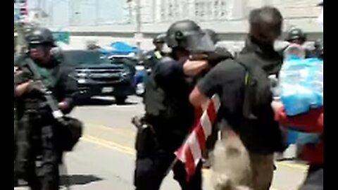 SHOCK MOMENT: Face-Off Between Anti-ICE Demonstrator And LAPD Leads To Physical Confrontation