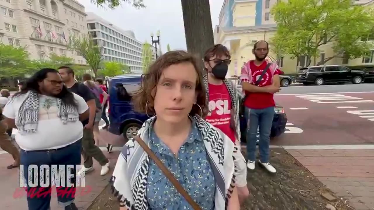 Left wing agitators try to stop media from filming van loaded with protests signs, suspicious