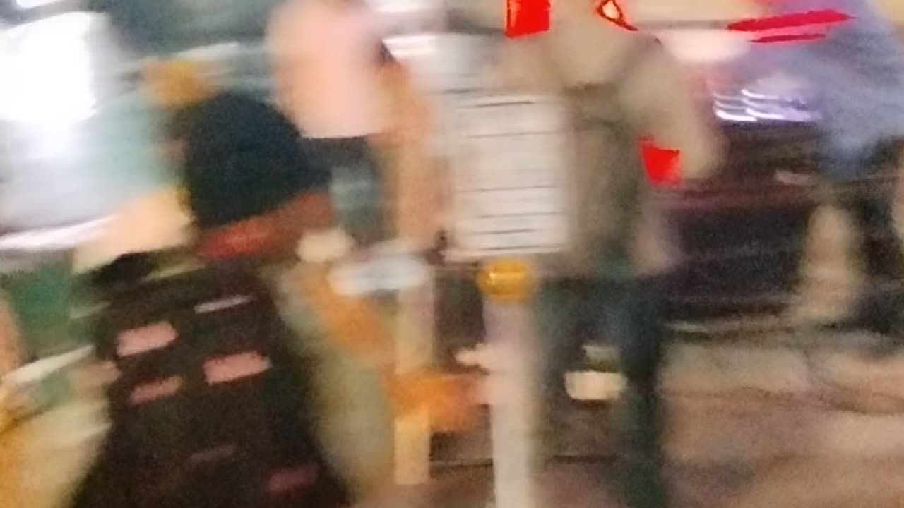Having fun Downtown outside Utopia Smoke Shop with a DJ with LEDs and lasers