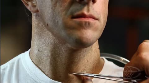 Silicone hands...Here's how they did it…If you look closely in the slow motion video, you can see that the silicone mask he's wearing inflates slightly.