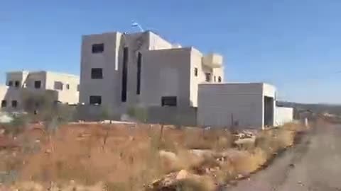 Israeli occupation forces convert a Palestinian house into a military outpost in west bank