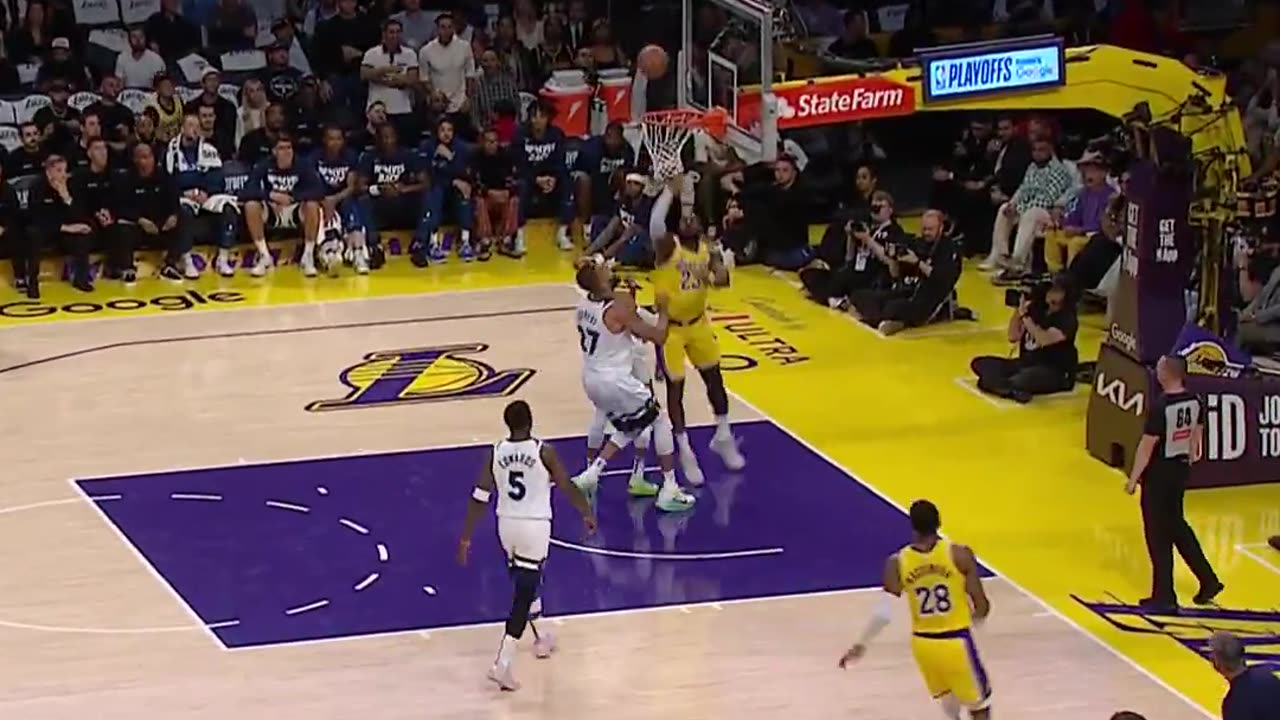 NBA - Luka pull-up triple... LeBron muscles for two.