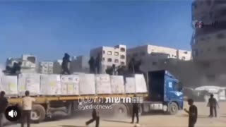 Armed men on humanitarian aid trucks today in the Gaza Strip