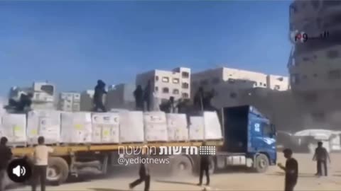 Armed men on humanitarian aid trucks today in the Gaza Strip