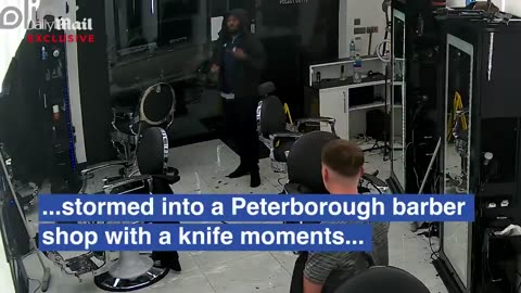 Moment 'knifeman who hurt 11 people in Huntingdon train rampage storms into Peterborough barber shop