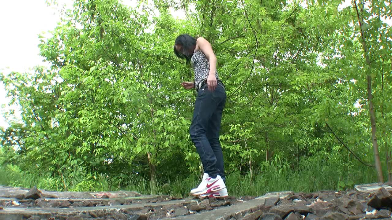 Walkover Snail Crush in Park with Sneakers