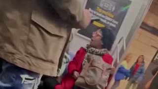 Blàck lady pushes Hispanic lady off seat